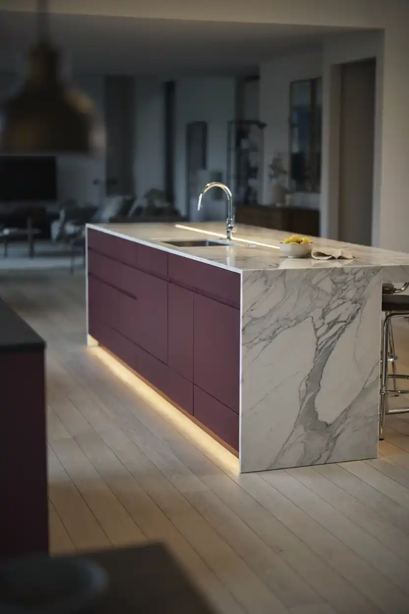 Aubergine Kitchen with a Marble Waterfall Countertop